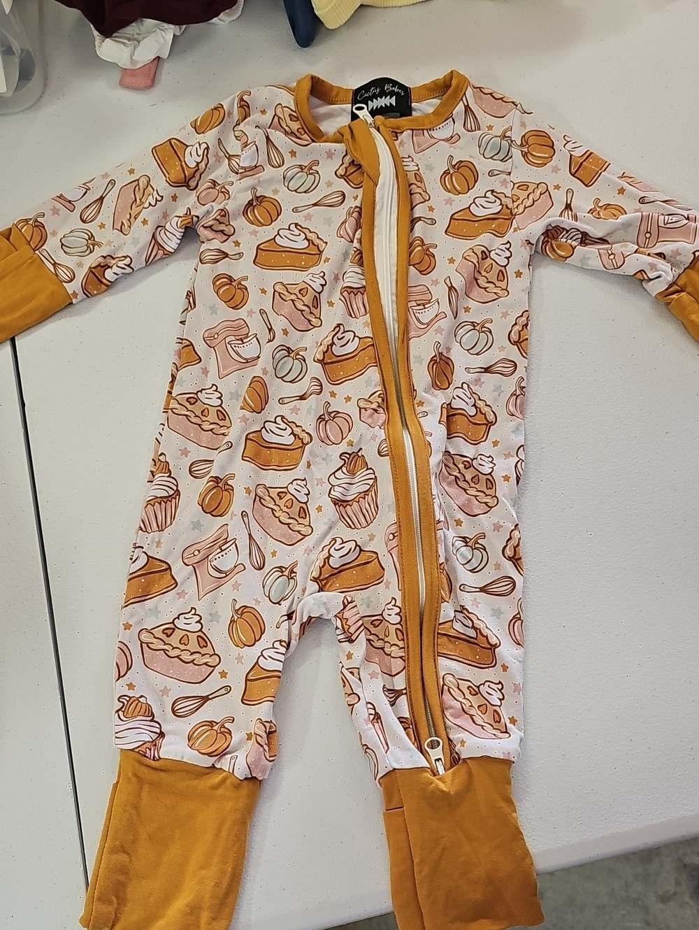 Cozy Pumpkin Pie Print Footed One-Piece - White & Mustard